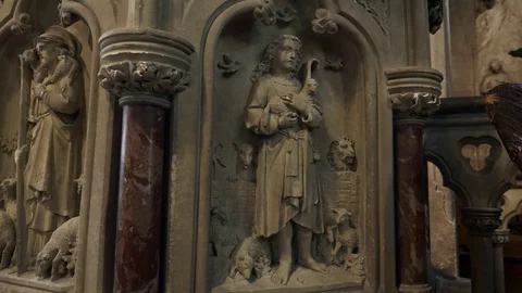 Stone Statue of David Shepherd with Sheep. Gothic Medieval Architecture Church Stock Footage 129229004
