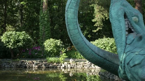 Stone statue of a dinosaur 스톡 동영상 94431372