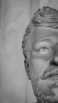 Stone statue of half man head Stock Photos