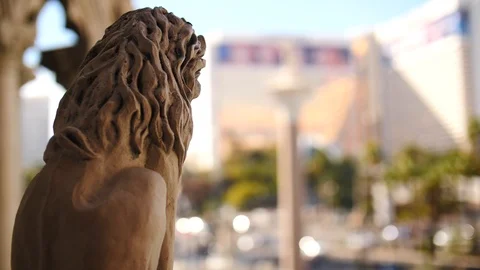 Stone statue looking over Las Vegas close up city tourism Stock Footage 105225994