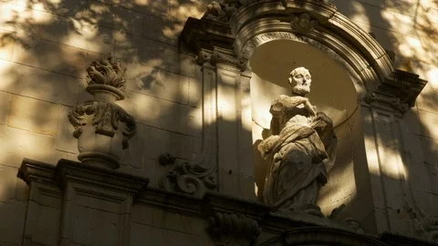 Stone statue on side of a building in the Gothic Quarter, Barcelona, Spain. Stock Footage 127324573