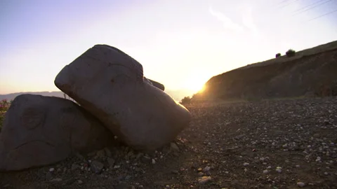 Stone statue sunset Stock Footage 166865597