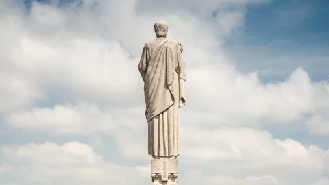 Stone Statue at the top of the Duomo di Milano. Time lapse video. Stock Footage 88310253