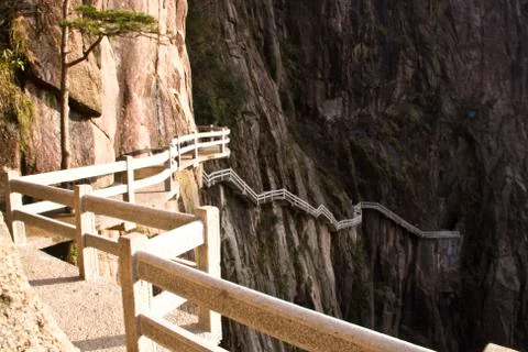 Stone Steep Steps . Trekking walking hiking Huangshan Mountain. Anhui, China. Stock Photos