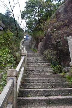 Stone Steep Steps . Trekking walking hiking Huangshan Mountain. Anhui, China. Stock Photos