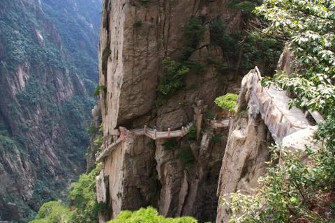 Stone Steep Steps . Trekking walking hiking Huangshan Mountain. Anhui, China. Stock Photos