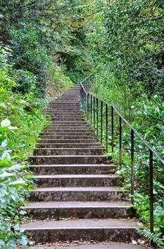 Stone steps and railing Stock Photos