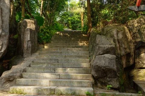 Stone steps with blocks of stones on the sides Stock Photos