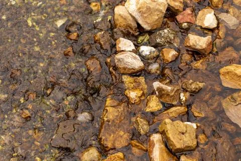 Stone stream in the mountains as a background Stock Photos