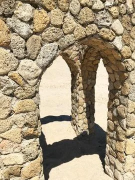 Stone structure on the beach. Stock Photos