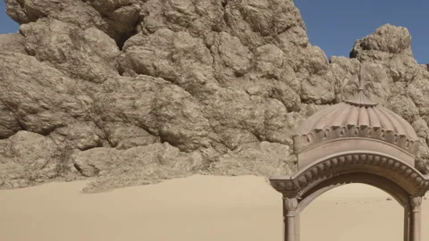 Stone structure near sandy area with large rock formations in background Stock Footage 344956184
