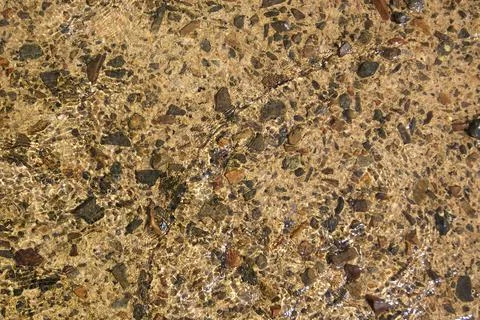 The stone surface is covered with water on top Stock Photos