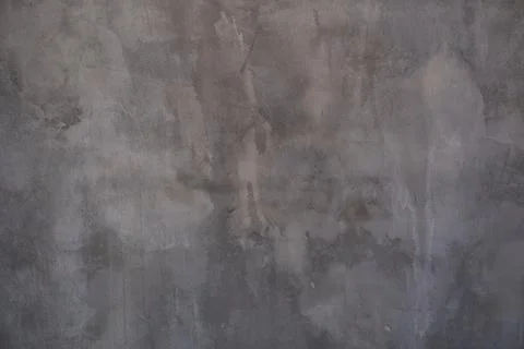 Stone surface with dark spots. The texture of old flagstone in the grunge style Stock Photos