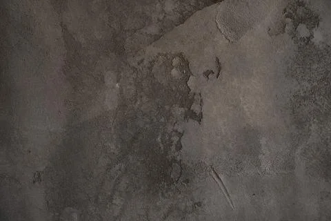 Stone surface with dark spots. The texture of old flagstone in the grunge style Stock Photos