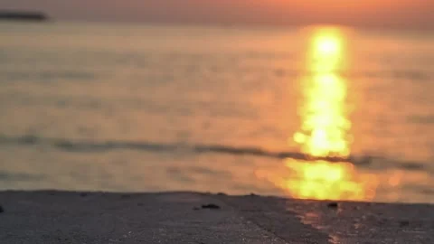 Stone table surface and blurred sunset sea Stock-Footage 158434066