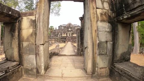 Stone Temple Revealed Through a Gateway in Cambodia Stock Footage 348173523