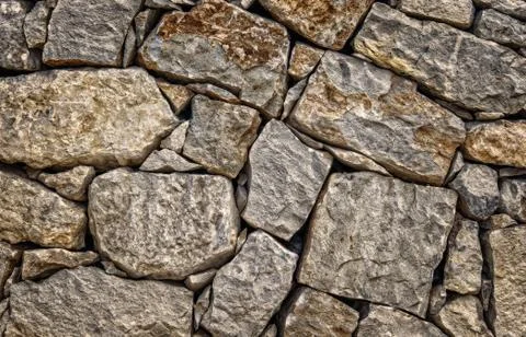 Stone texture and background. Abstract background made with stones. Stock Photos