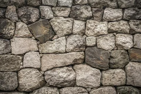 Stone texture and background. Abstract background made with stones. Stock Photos