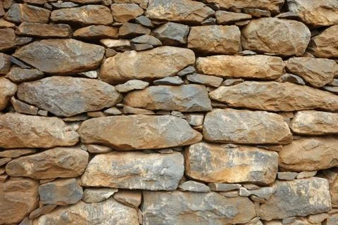 Stone texture and background. Abstract background made with stones. Stock Photos