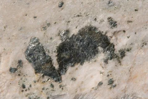 Stone texture and background. Rough natural rock with silver. Stock Photos