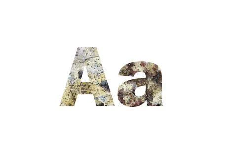 Stone texture for background. Shot through cut-out silhouette of the letter A Stock Photos