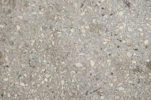 Stone texture background small stones in cement floor Stock Photos