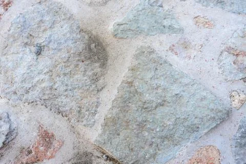 Stone texture of old ancient wall in sunny day. Modern luxury background for  Stock Photos