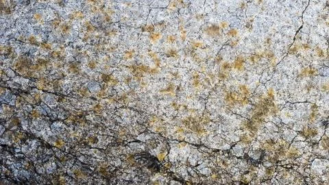 Stone texture or background. Coarse cracked stone structure of the face. empt Stock-Fotos