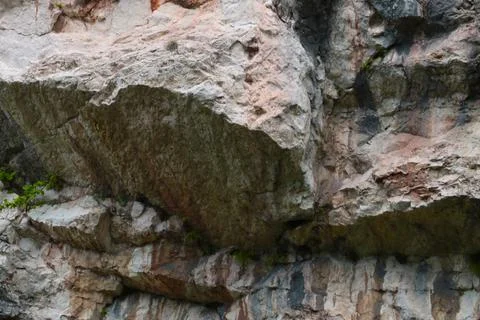 Stone texture of a rock or mountain, background. Stock Photos