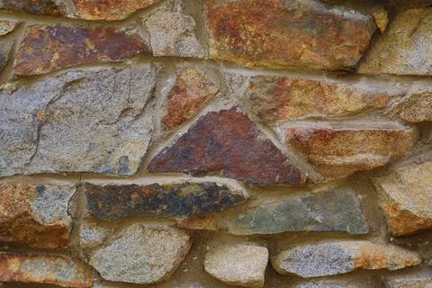 Stone texture in tones of red, brown, and grey Stock Photos