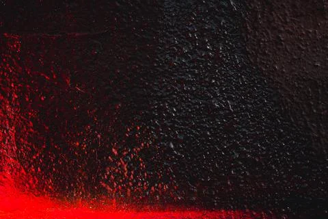 Stone texture. Wall red abstraction. Dark Backgrounds. Lava frozen. Paint spo Stock Photos