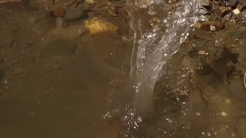 Stone thrown in the stream, Alta Badia Video stock 79485833