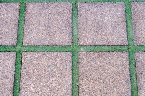 Stone tile background consisting of pebbles cut Stock Photos