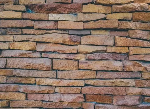 Stone tile brick wall texture background., Background texture of stone wall., Stock Photos
