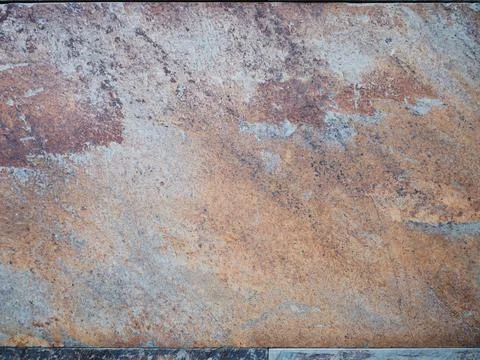 Stone tile wall background with a space for text or design. Stock Photos