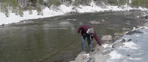 Stone Toss by Mountain River Video stock 243761758