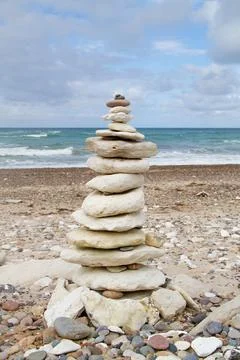 Stone tower on the beach Stock Photos