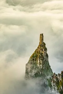 Stone tower between clouds in the Funion Canyon in the Santa Catarina mountai Stock Photos