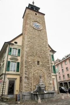 Stone tower with a clock. Photos