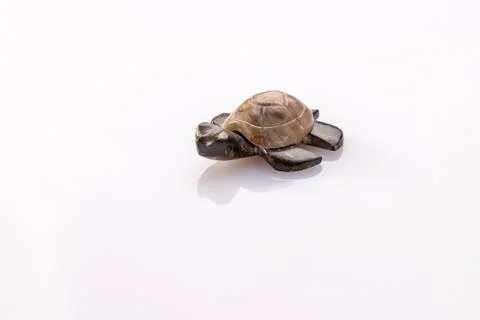 Stone toy turtle Stock Photos