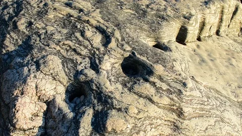 Stone with traces of ancient processing, close-up Stock Footage 110836193
