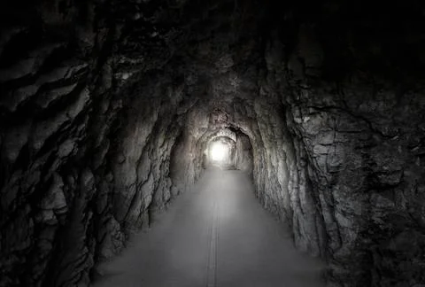 Stone tunnel under a mountain Stock Photos