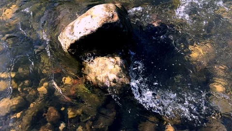 Stone under  wave Stock Footage 125804201