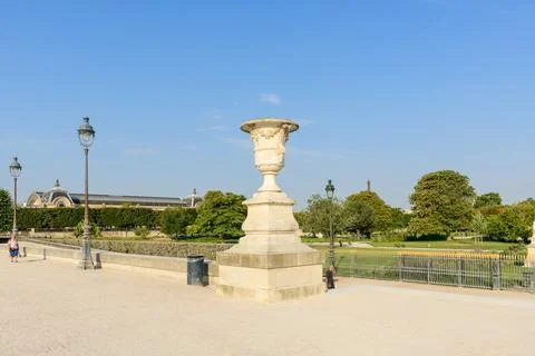 Stone urn and lamp posts in Jardin des Tuileries, Paris, France. Stock Photos