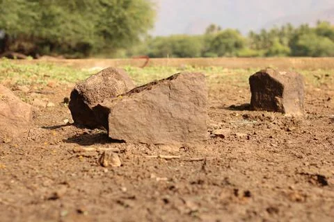 A stone used for cooking with raw tree fuel Foto stock