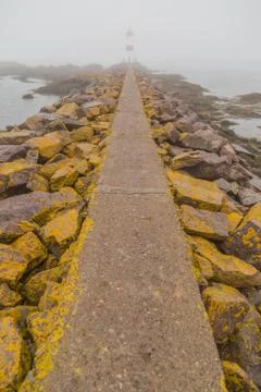 Stone Walkway to Lighthouse Stock Photos