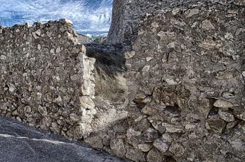Stone wall abandoned architecture. Stock Photos