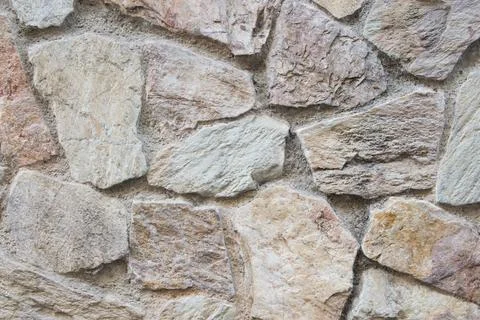 Stone wall of the acient castle. Stock Photos
