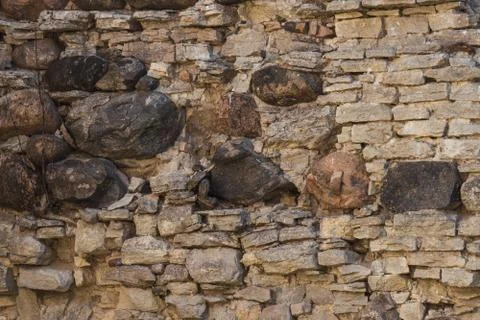 Stone wall of an ancient monastery destroyed during the Livonian War in the Midd Stock Photos