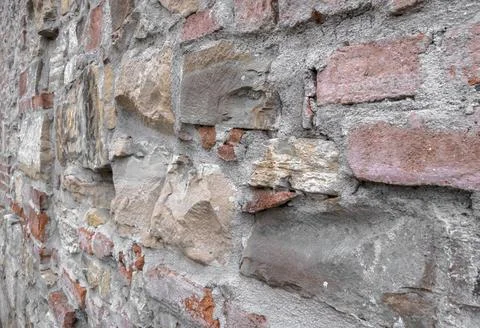 Stone wall Ancient wall made up of irregular stones with warm colors Copyr... 스톡 사진